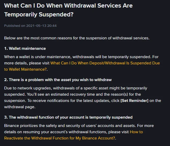 Scheda del Centro assistenza Binance "What Can I Do When Withdrawal Services Are Temporarily Suspended?", pubblicata il 13 maggio 2021, con le tre cause elencate: manutenzione del wallet, problema sull'asset da prelevare con tempo di ripristino stimato e pulsante Set Reminder, sospensione della funzione di prelievo dell'account